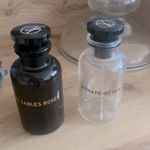 Empty Louis Vuitton perfume bottles